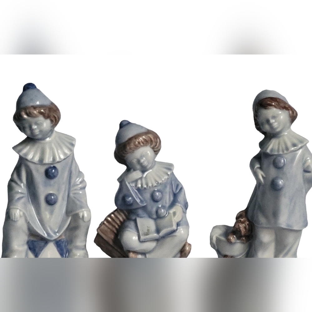 Vintage 80s blue ceramic Boy & Girl Figurines.